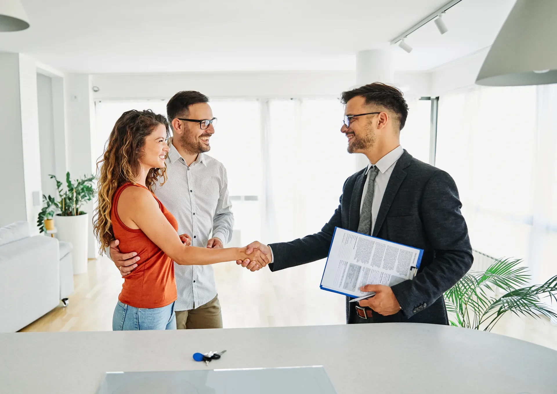 An agent in conversation with clients — the loyalty at stake when one firm sits on both sides