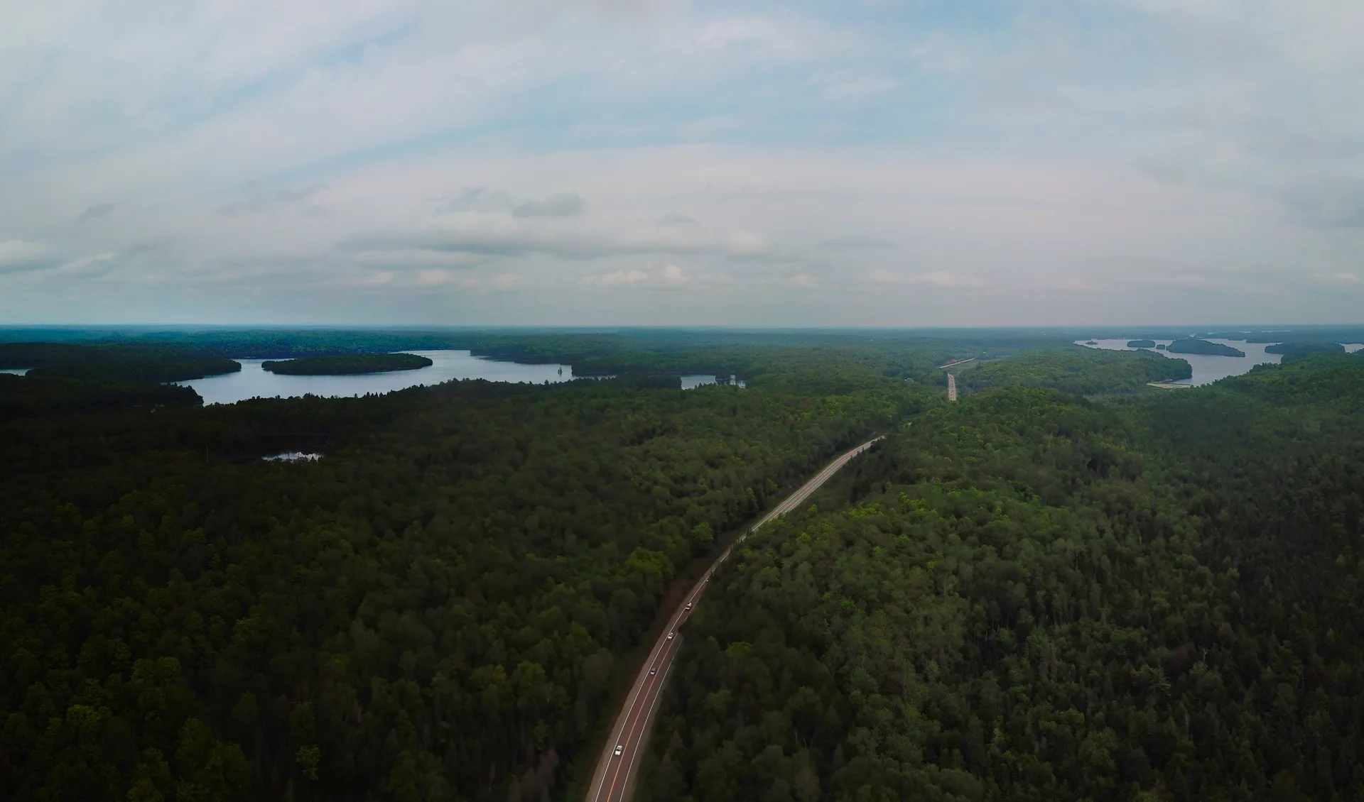 Ontario highway and farmland from the air — the province's lead sellers quote every market from the GTA to the small towns