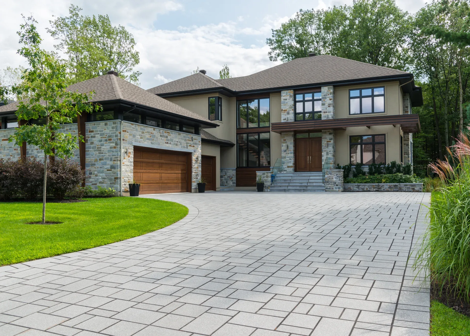 A detached home at dusk — its final sale price is VOW data, visible only to signed-in visitors