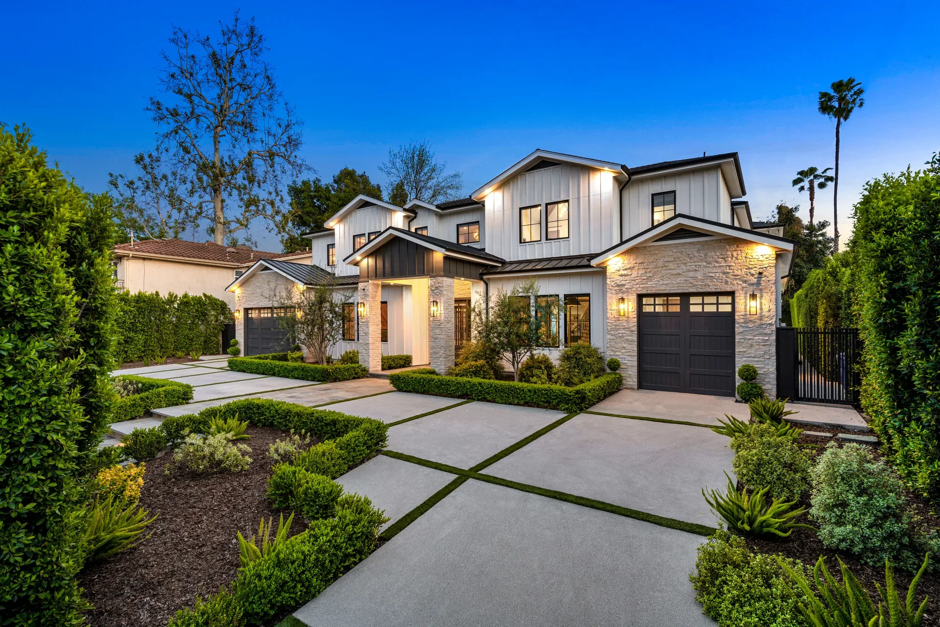 A detached home with a for-sale sign — the kind of listing a dedicated marketing site is pitched for