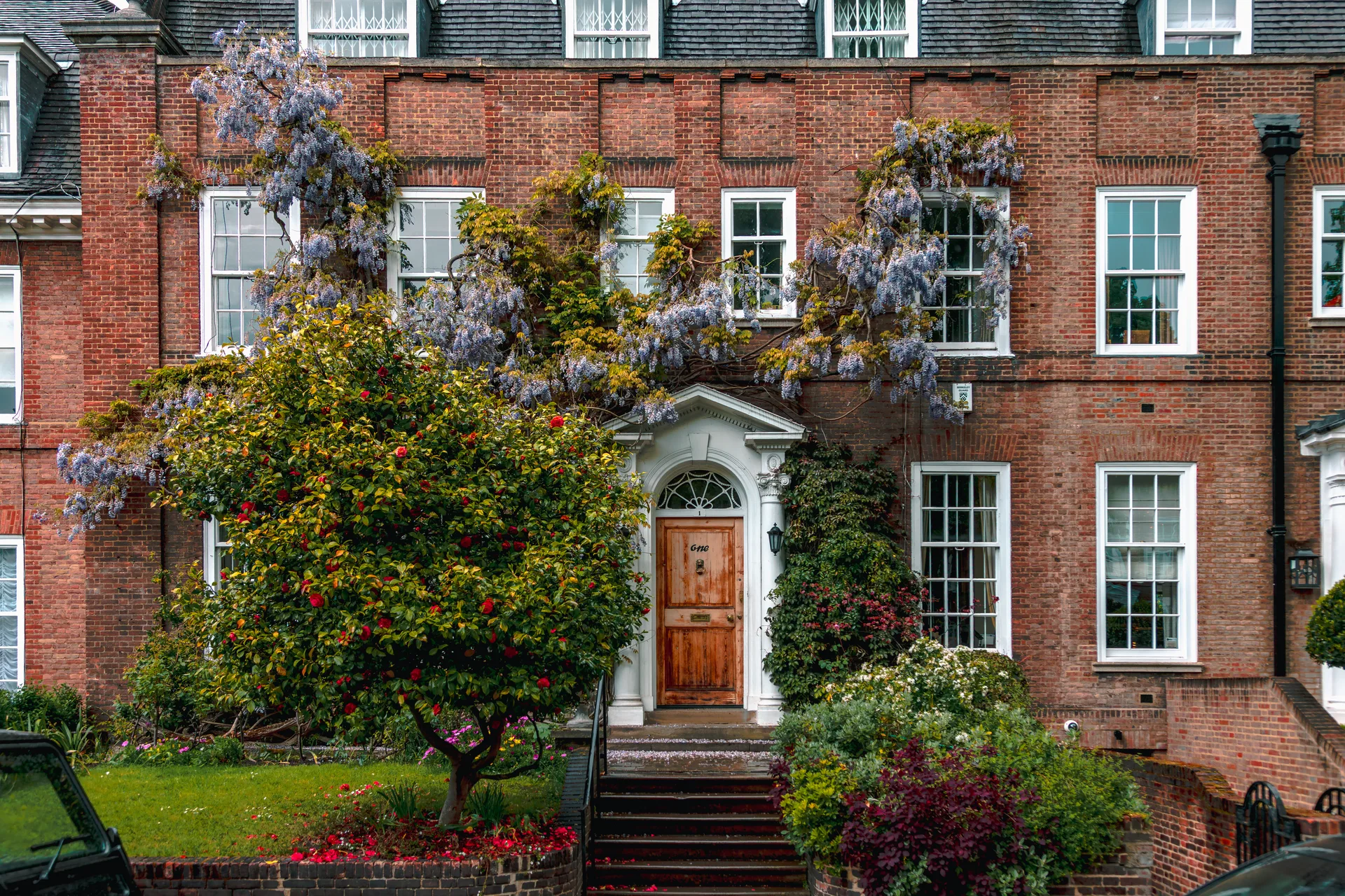 A stately brick townhouse with classical detailing, the heritage architecture an old river city is known for