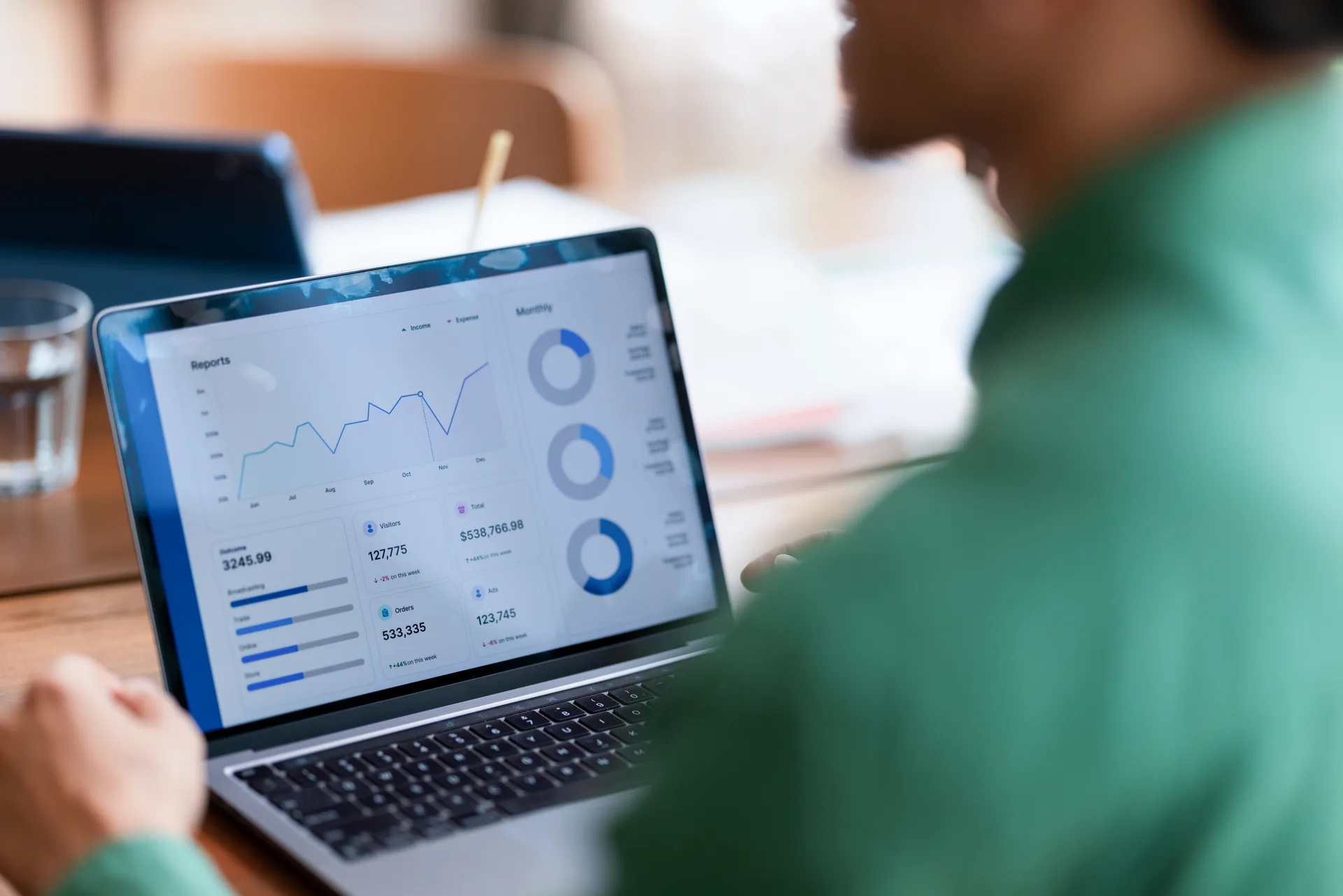 A traffic dashboard open on a laptop — a lead generation website is judged on registrations, not visits