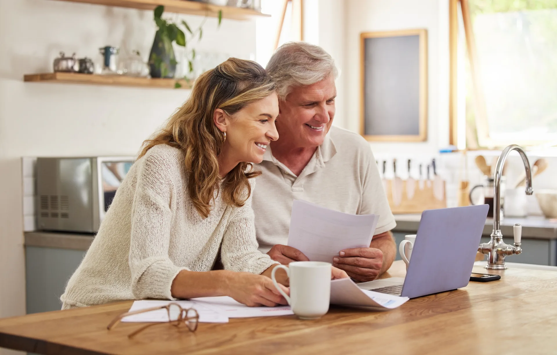 Two people browsing listings together on a laptop — every capture moment starts as an ordinary browsing session