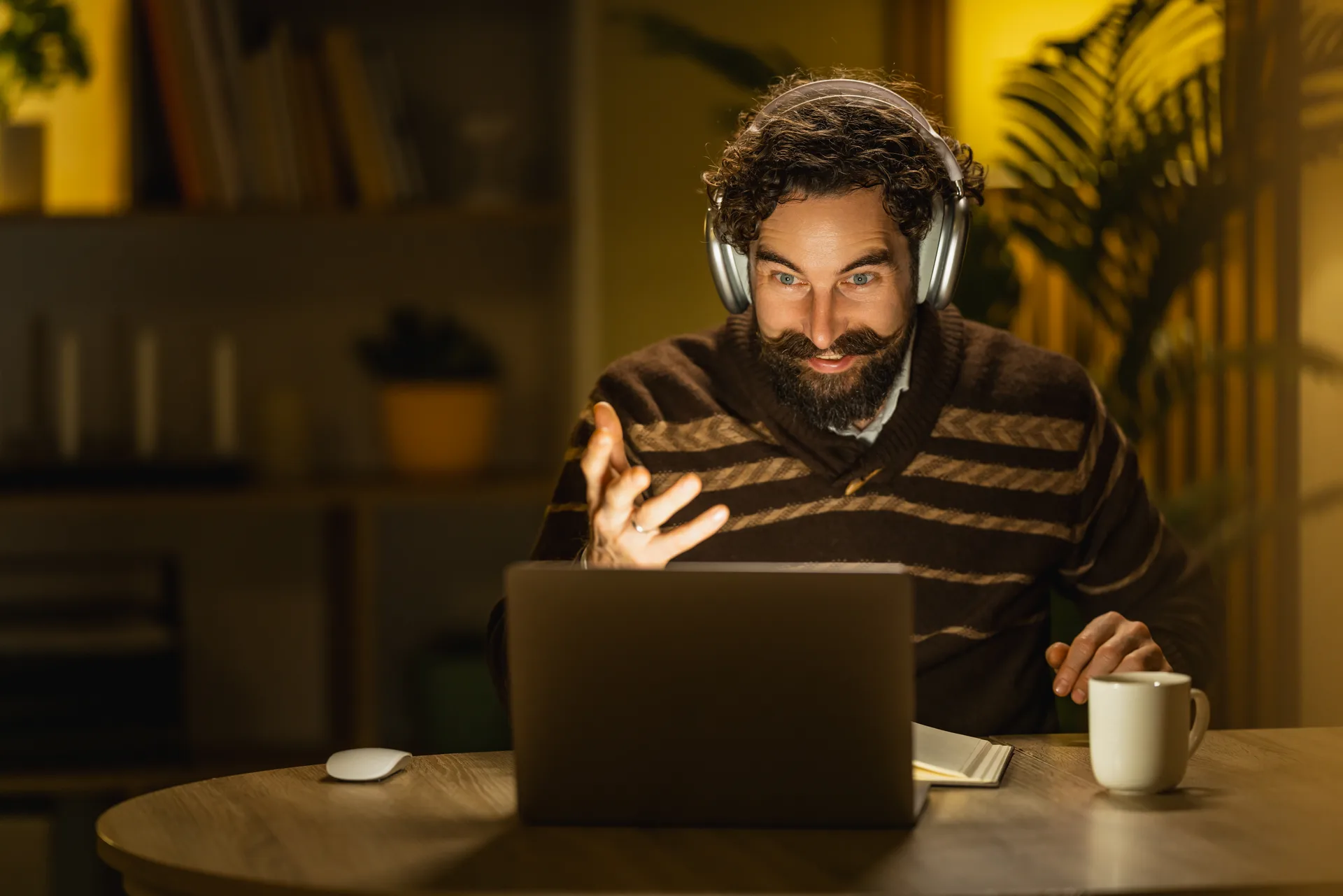 An inside sales agent working leads by video call from a home office